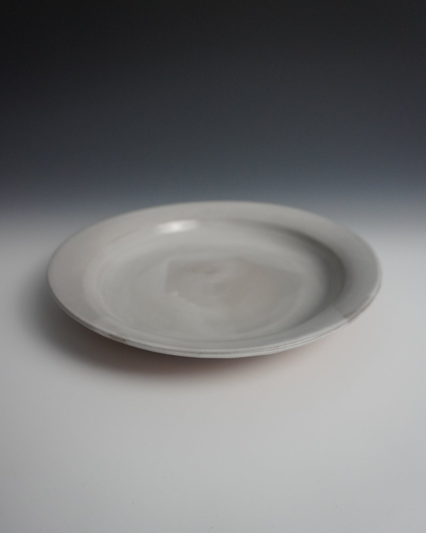 shallow white glazed pasta bowl