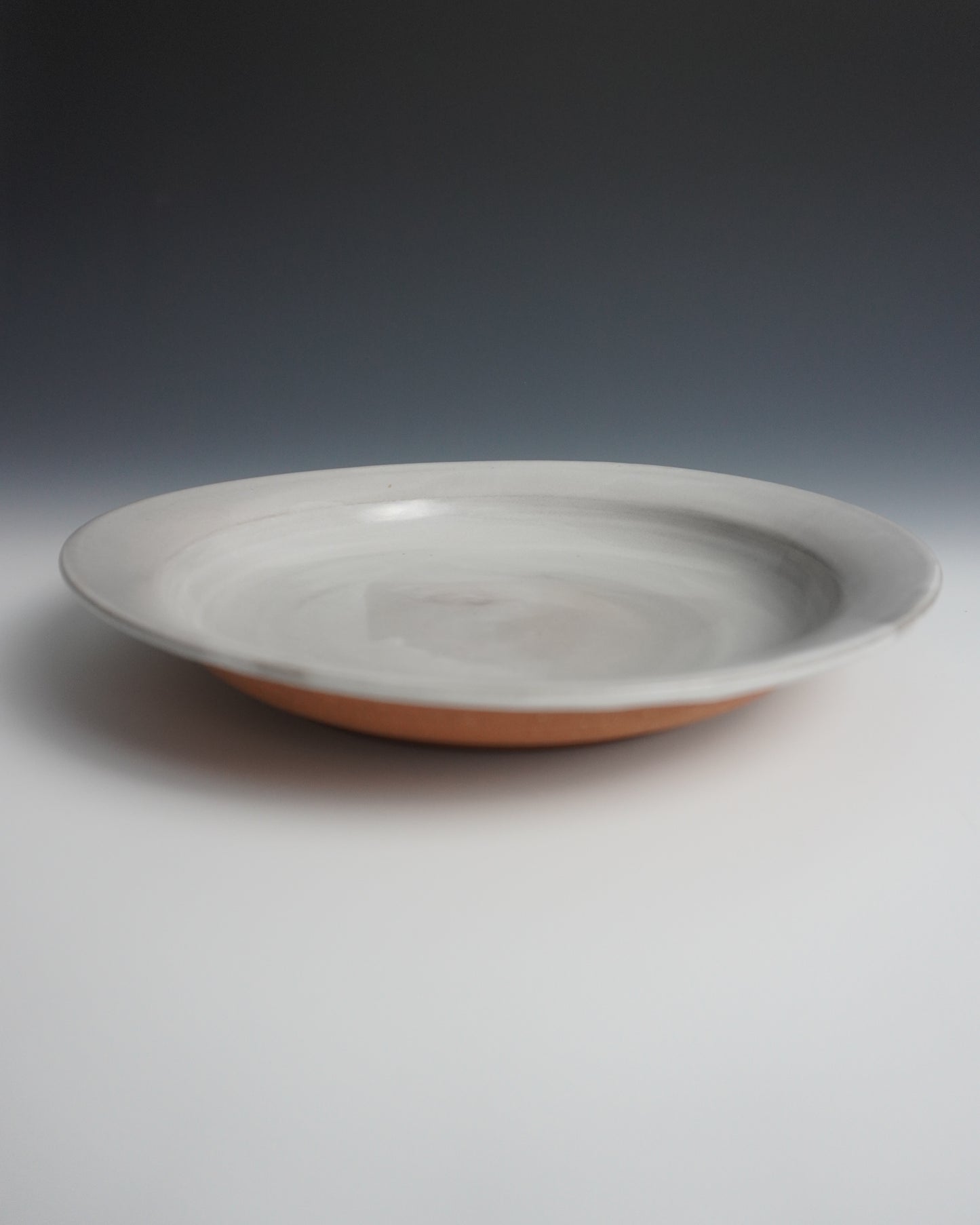 shallow white glazed pasta bowl